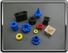 Precision caps and grommets, molded by PRD